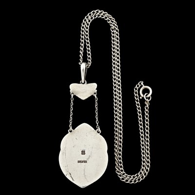 Lot 35 - Liberty & Co., an Arts & Crafts silver enamel pendant with later chain