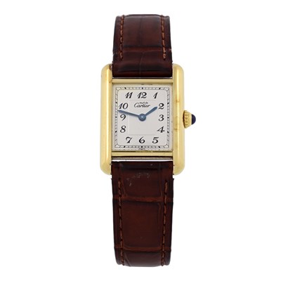 Lot 239 - Cartier, a silver-gilt Must de Cartier Tank wrist watch