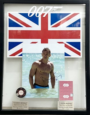 Lot 632 - Framed James Bond Casino Royale memorabilia,...