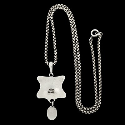 Lot 26 - Liberty & Co., by William Hair Haseler, an Arts & Crafts silver enamel pendant, with later chain