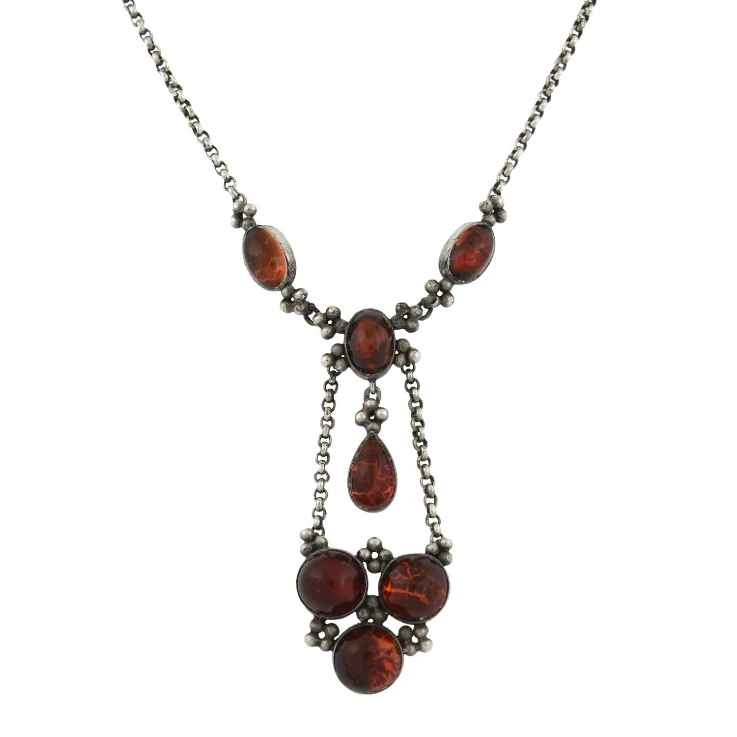 Lot 6 - An Arts & Crafts foil-backed orange gem pendant necklace