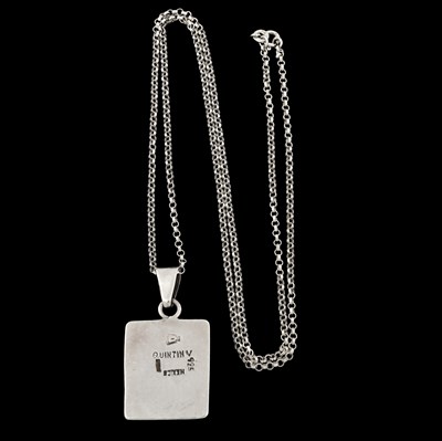 Lot 76 - A Mexican hardstone plaque pendant and chain