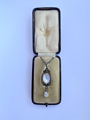 Lot 40 - Archibald Knox (attributed) for Liberty and Co., an Arts & Crafts moonstone & diamond pendant