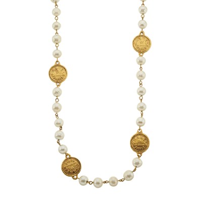 Lot 328 - Chanel, a gold-tone medallion and faux pearl necklace.