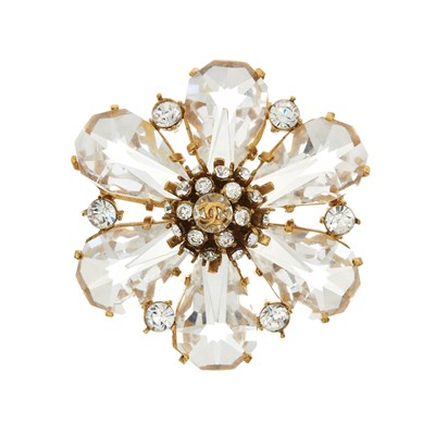 Lot 337 - Chanel, a colourless paste floral pin brooch.