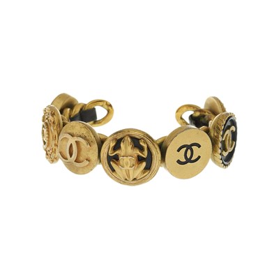 Lot 351 - Chanel, a vintage charm cuff bracelet.