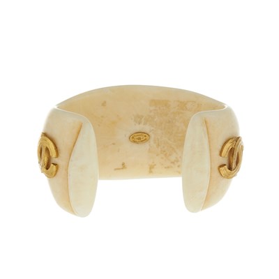 Lot 336 - Chanel, a cream resin CC cuff bangle.