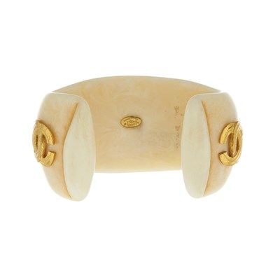 Lot 341 - Chanel, a cream resin CC cuff bangle.