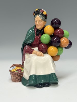 Lot 107 - A Doulton balloon seller HNI3I5, h: 19cm (1)