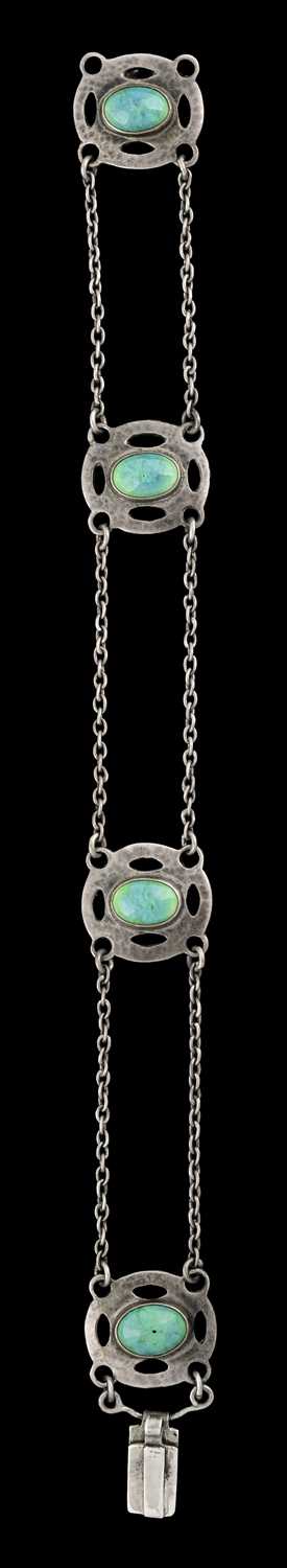 Lot 61 - Ruskin, an Arts and Crafts silver coloured...