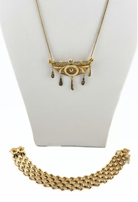 Lot 468 - A filigree brooch with chain, and a costume jewellery Grosse bracelet