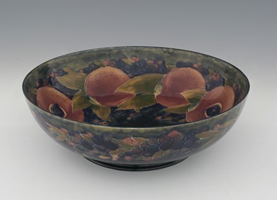 Lot 259 - William Moorcroft, a large Pomegranate bowl,...