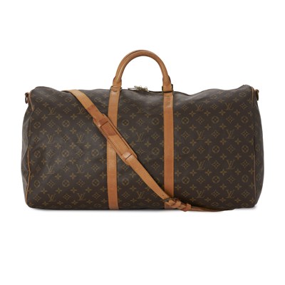 Lot 445 - Louis Vuitton, a vintage monogram Keepall Bandouliere 60 luggage bag.