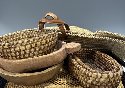 Lot 82 - A set of four woven rattan placemats, 47.5 by...