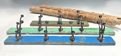 Lot 209 - Three coat and hat rails, the backplates with...