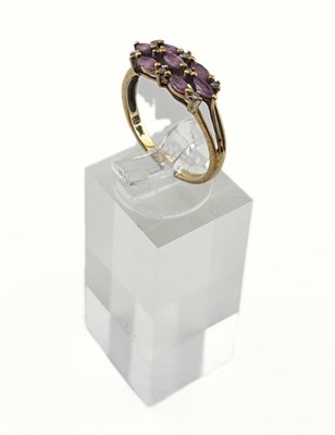 Lot 487 - A 9ct gold pink sapphire and single-cut diamond ring