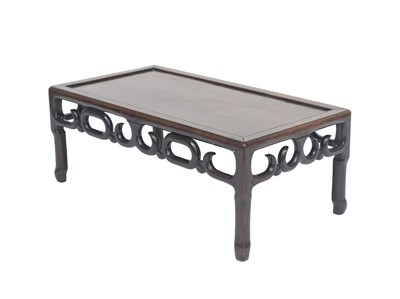 Lot 162 - A Chinese hardwood low table, late Qing...