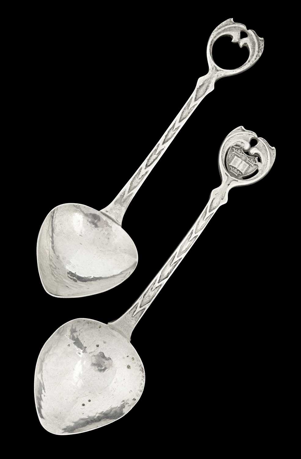 Lot 98 - A E Jones, two Arts and Crafts silver spoons,...