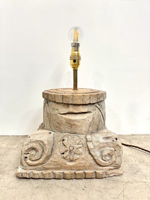 Lot 183 - A carved wooden lamp base, inverted Ionic...
