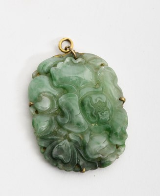 Lot 146 - A Chinese jadeite pendant, oval carved with...