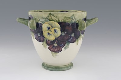 Lot 256 - William Moorcroft, a large Pansy on White twin...