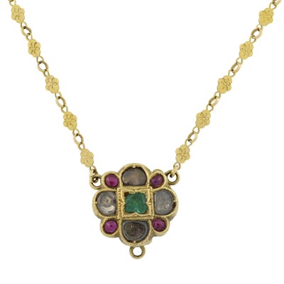 Lot 566 - An Indian ruby, emerald and white sapphire quatrefoil pendant necklace