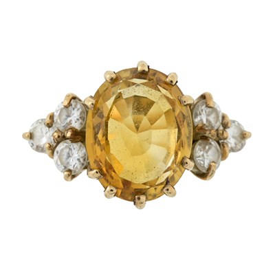 Lot 526 - A citrine and cubic zirconia dress ring