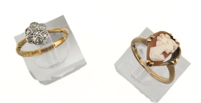 Lot 500 - An early 20th century 9ct gold single-cut diamond cluster ring and a 9ct gold shell cameo ring