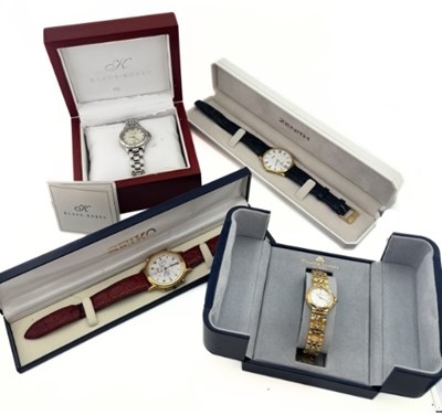 Lot 376 - A mixed group of boxed watches, to include a...