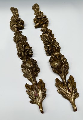 Lot 270 - A pair of gilded fruit and floral cast resin...
