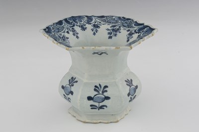 Lot 740 - A Dutch Delft blue and white spittoon, 18th...