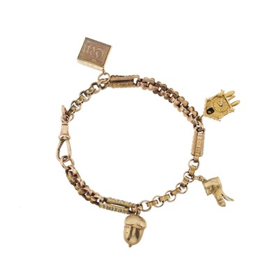 Lot 28 - A 9ct gold charm bracelet