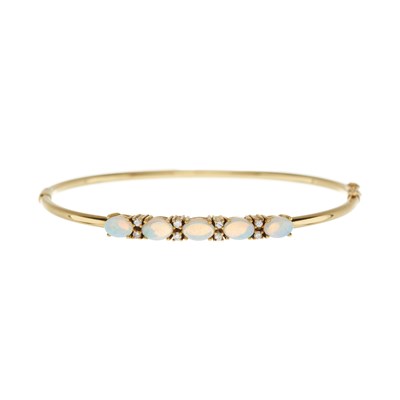 Lot 210 - An 18ct gold opal and diamond bangle and a pair of opal earrings