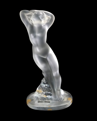 Lot 728 - Lalique, Statuette Bras Leves, a glass figural...