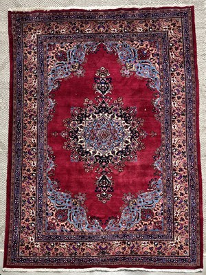 Lot 751 - A large thick pile knotted carpet, Persian...