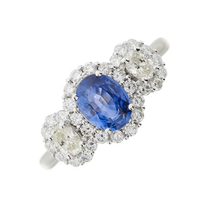 Lot 56 - A sapphire and diamond triple cluster ring