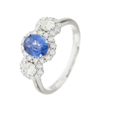 Lot 56 - A sapphire and diamond triple cluster ring