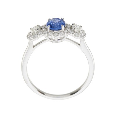 Lot 56 - A sapphire and diamond triple cluster ring
