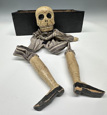 Lot 281 - A skeleton puppet with marionette strings,...
