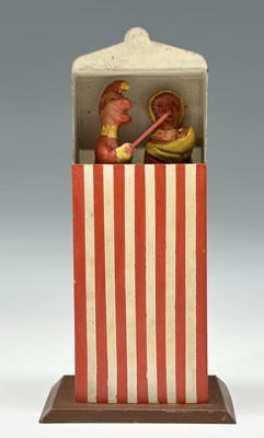 Lot 283 - A painted tin plate wind-up mechanical Punch...