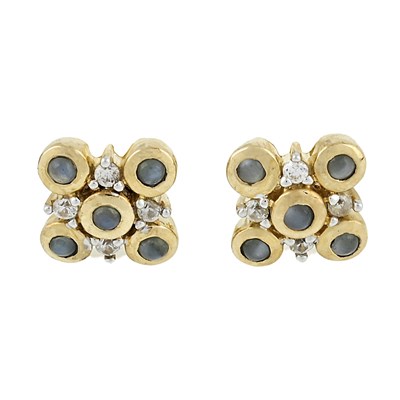 Lot 486 - A 9ct gold cat's-eye chrysoberyl and zircon ring and a pair of matching earrings