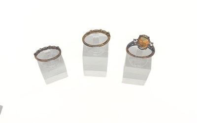 Lot 489 - Three 9ct gold gem-set rings