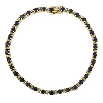 Lot 555 - A 9ct gold sapphire and single-cut diamond line bracelet