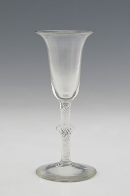 Lot 689 - An opaque twist wine glass, circa 1760, the...