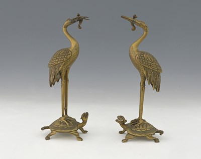 Lot 152 - A pair of Oriental brass figures, modelled as...
