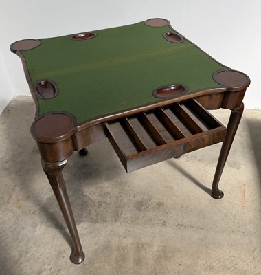 Lot 766 - An mid 18th century mahogany fold over games...