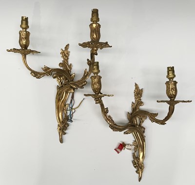 Lot 200 - A pair of French cast brass, wall sconces...