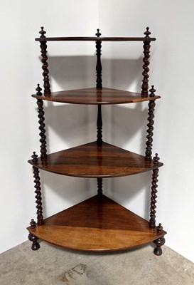 Lot 794 - A mid 19th century rosewood, four tier whatnot,...