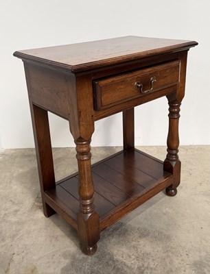 Lot 801 - A small traditional oak side or bedside table,...