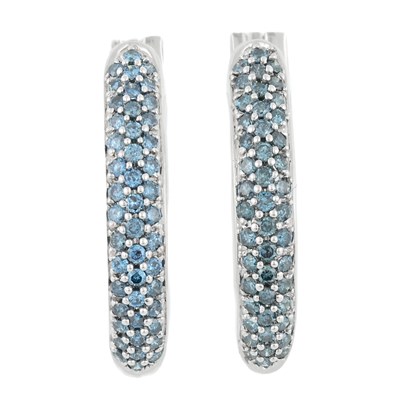 Lot 552 - A pair of 14ct gold treated blue diamond hoop earrings